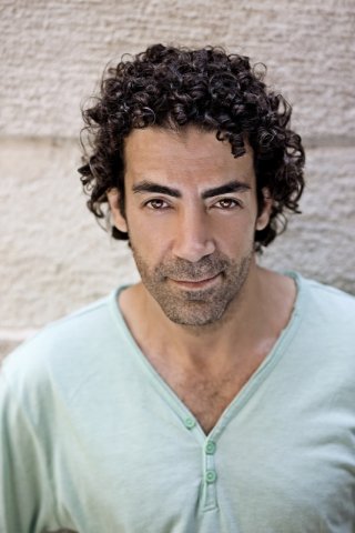 Толга Эврен